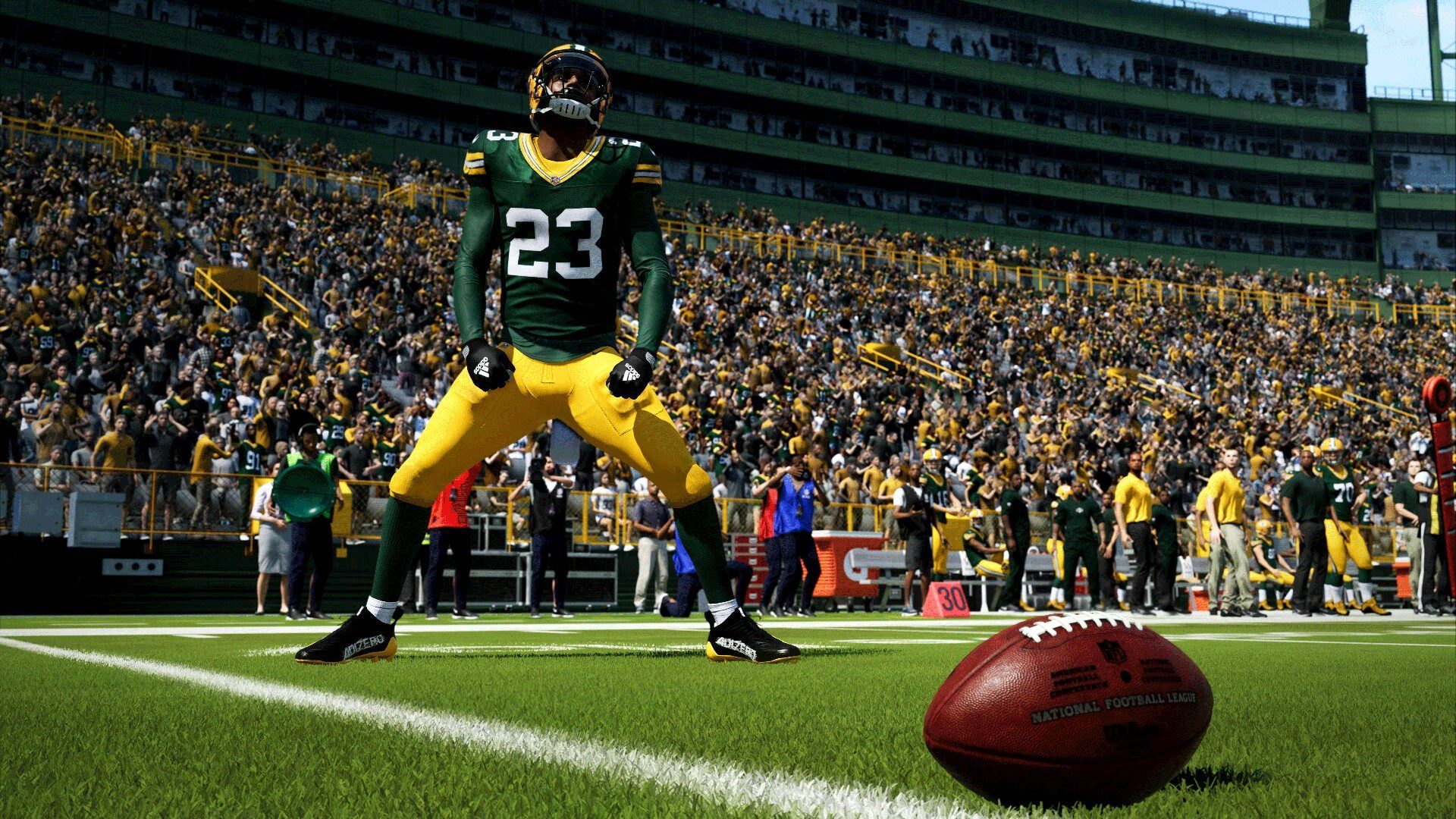 2023-12-madden-nfl-24-66cc7d112b5676090d02d96f-1 توپ و بازیکن فوتبال آمریکایی در بازی Madden NFL 24