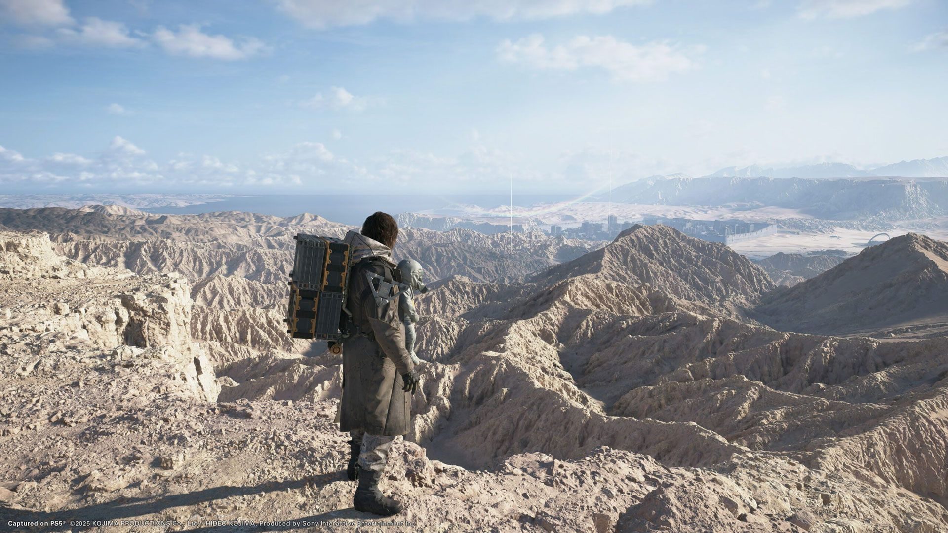 deathstranding2onthebeachkojimaproductionsdecimaengine-67cec5fe2b6f4ce0b26e8703-1 ترجمه کامل آهنگ رسمی بازی Death Stranding 2 + تصویری از گرافیک فوق العاده بازی دث استرندینگ ۲، اثر استودیو ژاپنی کوجیما پروداکشنز و ساخته شده با موتور بازی سازی دسیما استودیو هلندی گوریلا